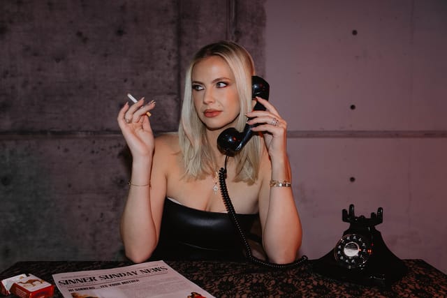 The hotline desk with the Sinner Sunday News